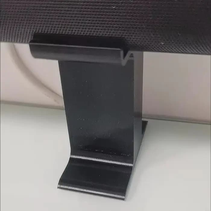 Base ergonomique pour barre de son