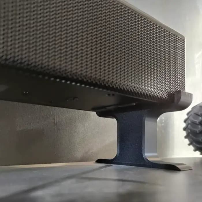 Base ergonomique pour barre de son