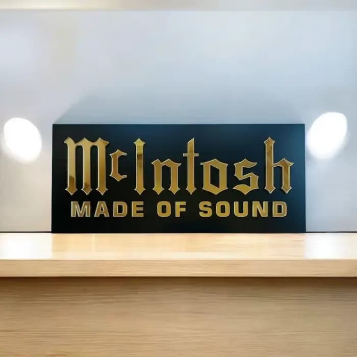 Panneau mural McIntosh – Plaque en acrylique miroir doré pour salle de cinéma